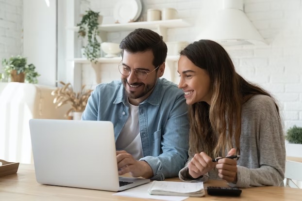 Couple looking at a computer