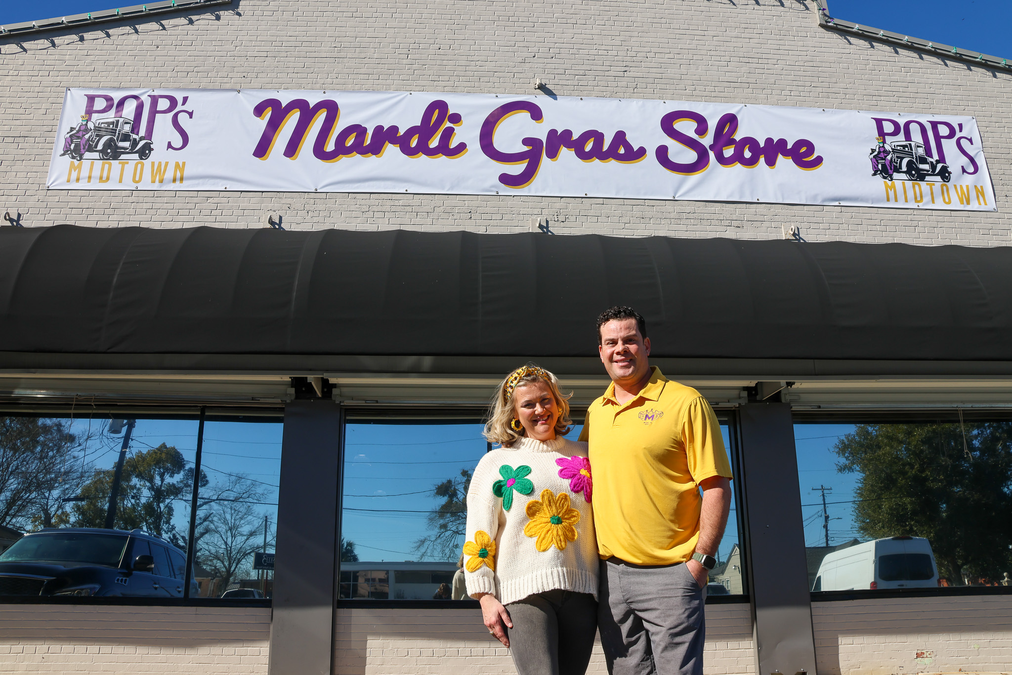 Mandi and Josh Cameron in front of Pop's Midtown