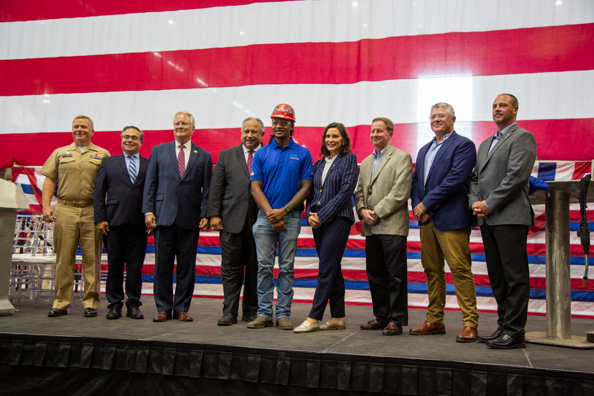 Officials pose for EPF 16 keel laying photo