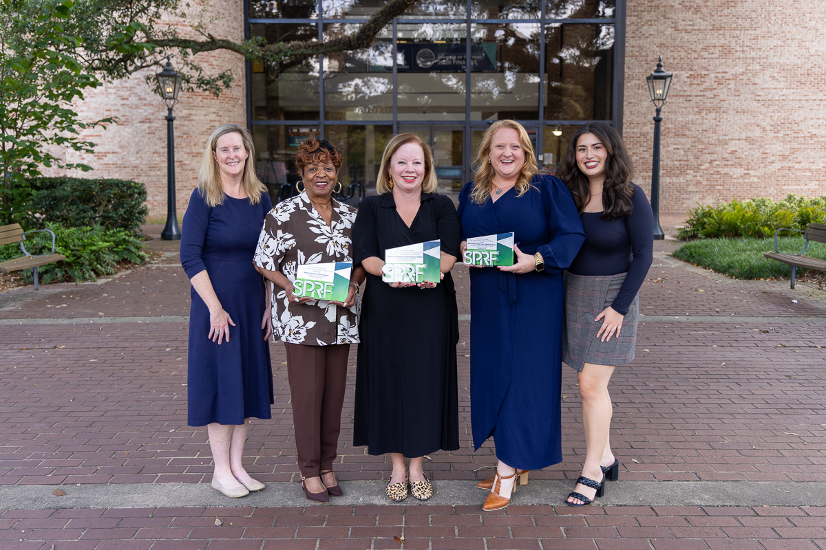 Mobile Chamber Communications team holding SPRF Awards - 2026